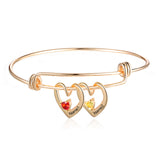 Rhodium Plated Heart Bangle Bracelet